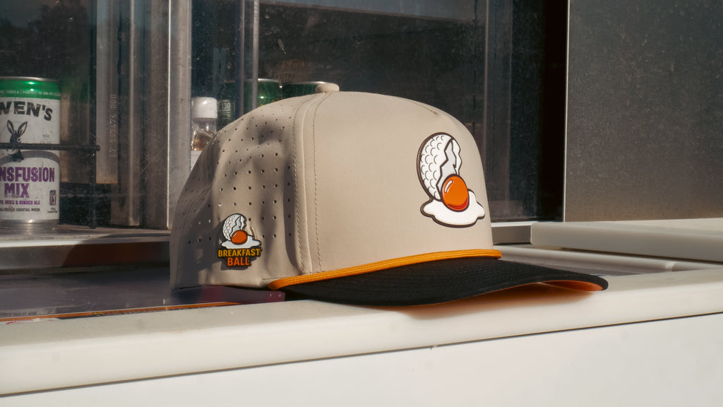 7.1Breakfast Ball Golf Hat | Snapback Cap | Built-in Magnetic Ball Marker Holder + Marker Included | Breakfast Ball | Adjustable | Mulligan Tan
