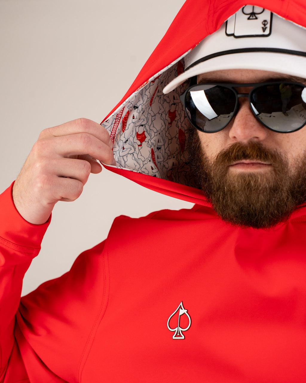 7. Performance Golf Hoodie - Coca-Cola Red